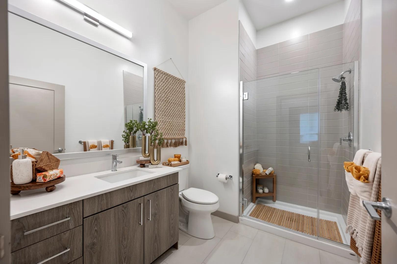 Revio_INT_Apartments_2BedroomDen_PrimaryBedroomEnsuiteBathroom_Gunnar_Sept2025